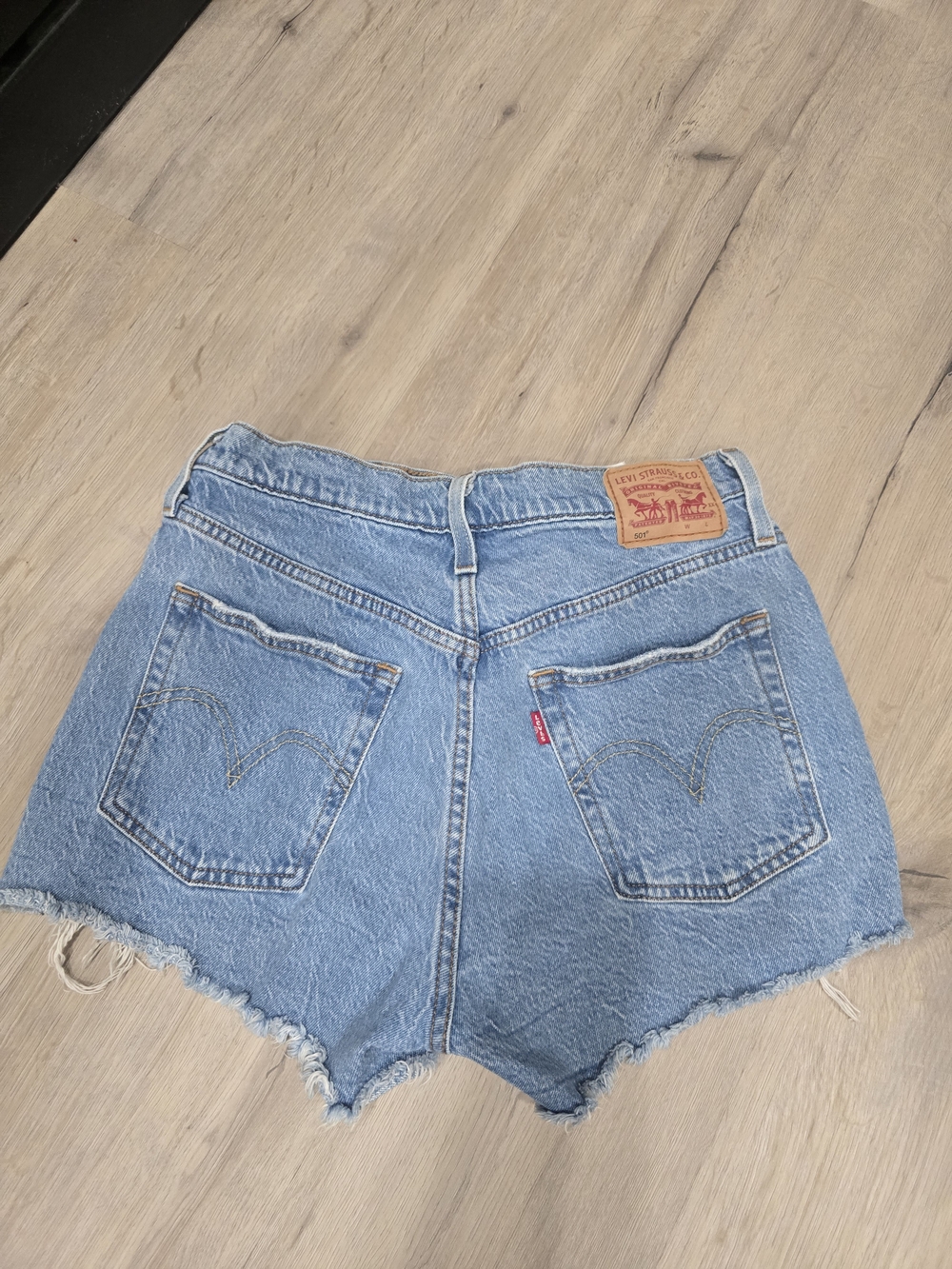 Levi's Medium Blue Denim Frayed Hem Cutoff Shorts